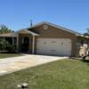PRICE IMPROVED! Port Charlotte home for sale: 3 bed/2 bath home with an updated kitchen & lots of room for parking!