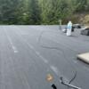 Torch-on roofing for commercial or residential flat roofs.