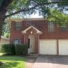 Traditional Round Rock Red Brick Two-Story